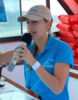 Melina Madeiros, naturalist on board of vessel Pura Mia at Whale Samana in Dominican Republic.